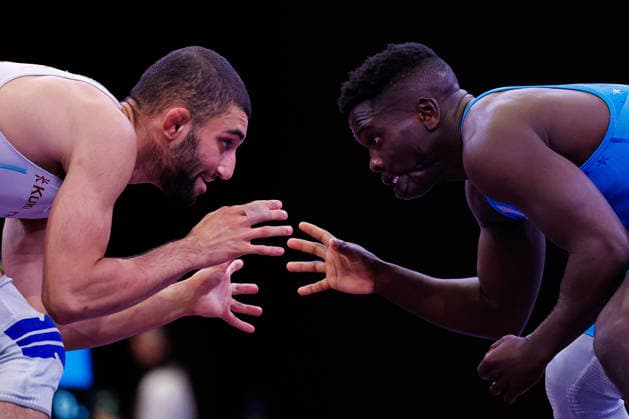 Sport Bilder des Tages U20 World Championships 57kg FS - Dunia Rodriguez Sibomana (COD) df. Danoush Jowkar (GBR) *** U20 World Championships, 57 kg Freestyle: Dunia Rodriguez Sibomana (COD) def. Danoush Jowkar (GBR) Copyright: xKostadinxAndonovx