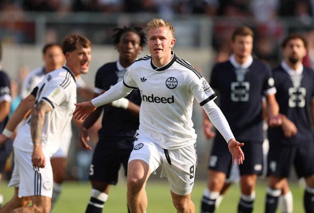 21.08.2026, Fussball DFB-Pokal, 1. Runde, SC St. Tönis - Eintracht Frankfurt, v.l., Torjubel zum 0:1 durch Jonathan Burkardt (Eintracht Frankfurt), Goal celebration, celebrate the goal DFL DFB REGULATIONS PROHIBIT ANY USE OF PHOTOGRAPHS AS IMAGE SEQUENCES AND OR QUASI-VIDEO. xdcx *** August 21, 2026, Soccer DFB Cup, 1st Round, SC St. Tönis vs. Eintracht Frankfurt, from left, goal celebration for the 0–1 by Jonathan Burkardt of Eintracht Frankfurt, goal celebration, celebrating the goal. DFL and DFB regulations prohibit any use of photographs as image sequences and or quasi-video. xdcx Copyright: HMBxMedia Claus