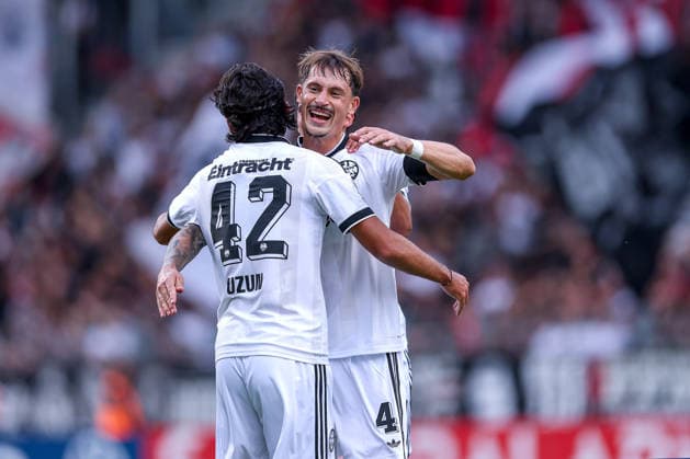 21.08.2026, Fußball, SC St. Tönis - Eintracht Frankfurt, 1. Runde DFB-Pokal 2026 27, Grotenburg-Stadion in Krefeld, Saison 2026 2027: Torjubel nach dem Tor zum 2:0 durch Torschütze Robin Koch (Eintracht Frankfurt 04) zusammen mit Can Uzun (Eintracht Frankfurt 42) DFB regulations prohibit any use of photographs as image sequences and or quasi-video. Nordrhein-Westfalen Deutschland *** August 21, 2026, Soccer, SC St. Tönis vs. Eintracht Frankfurt, First Round of the 2026–27 DFB Cup, Grotenburg Stadium in Krefeld, 2026–2027 season. Celebrations after the 2–0 goal by Robin Koch (No. 04, Eintracht Frankfurt) together with Can Uzun (No. 42, Eintracht Frankfurt). DFB regulations prohibit any use of photographs as image sequences and or quasi-video. North Rhine-Westphalia, Germany