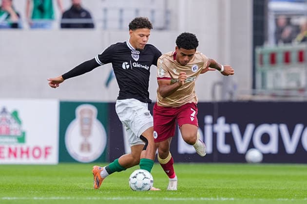 21.08.2026, xydrx, Fußball, DFB Pokal, SC Preußen Münster - Karlsruher SC, Saison 2026 2027, LVM-Preußenstadion: Montell Ndikom (SC Preußen Muenster, 28) im Zweikampf gegen Kevin Wiethaup (Karlsruher SC, 7) DFB regulations prohibit any use of photographs as image sequences and or quasi-video. *** August 21, 2026, xydrx, Soccer, DFB Cup, SC Preußen Münster vs. Karlsruher SC, 2026–2027 season, LVM Preußenstadion, Montell Ndikom, SC Preußen Münster, No. 28 in a tackle against Kevin Wiethaup of Karlsruher SC, 7. DFB regulations prohibit any use of photographs as image sequences and or quasi-video. Copyright: HMBxMedia YannisxDreimann