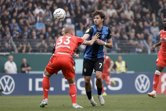 21.08.2026, xhettx, Fussball DFB Pokal 1.Runde, SV Waldhof Mannheim - 1.FC Kaiserslautern v.l. Jan Elvedi (1. FC Kaiserslautern, 33) im Zweikampf mit Lovis Bierschenk (SV Waldhof Mannheim, 7) (DFL DFB REGULATIONS PROHIBIT ANY USE OF PHOTOGRAPHS as IMAGE SEQUENCES and or QUASI-VIDEO) *** August 21, 2026, xhettx, Soccer DFB Cup First Round, SV Waldhof Mannheim vs. 1. FC Kaiserslautern, Jan Elvedi (1. FC Kaiserslautern), 33 in a tackle with Lovis Bierschenk of SV Waldhof Mannheim, 7 DFL and DFB regulations prohibit any use of photographs as image sequences and or quasi-video