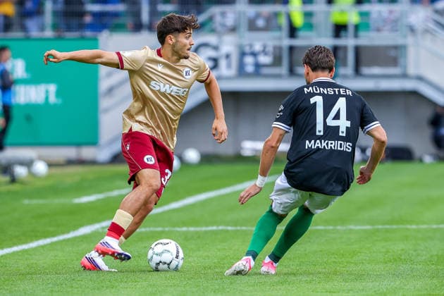 2026.08.21, xkwix, Fußball, DFB-Pokal, Preußen Münster - Karlsruher SC, LVM-Preußenstadion, 1.Runde, Saison 2026 2027: Rafael Pinto Pedrosa (Karlsruher SC 36) im Zweikampf gegen Charalambos Makridis (Preussen Muenster 14) DFB regulations prohibit any use of photographs as image sequences and or quasi-video. Photo: xKamilxWilkowskixPressefotoKochx Nordrhein-Westfalen Deutschland *** August 21, 2026, xkwix, Soccer, DFB Cup, Preußen Münster vs. Karlsruher SC, LVM Preußenstadion, 1st Round, 2026–2027 Season: Rafael Pinto Pedrosa of Karlsruher SC (No. 36) in a tackle against Charalambos Makridis of Preußen Münster (No. 14). DFB regulations prohibit any use of photographs as image sequences and or quasi-video. Photo: xKamilxWilkowskixPressefotoKochx, North Rhine-Westphalia Westphalia, Germany