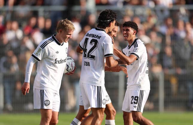 21.08.2026, Fussball DFB-Pokal, 1. Runde, SC St. Tönis - Eintracht Frankfurt, v.l., Torjubel zum 0:6 durch Can Uzun (Eintracht Frankfurt), Goal celebration, celebrate the goal, Ayoube Amaimouni-Echghouyab (Eintracht Frankfurt) DFL DFB REGULATIONS PROHIBIT ANY USE OF PHOTOGRAPHS AS IMAGE SEQUENCES AND OR QUASI-VIDEO. xdcx *** August 21, 2026, Soccer, DFB Cup, 1st Round, SC St. Tönis vs. Eintracht Frankfurt, from left, goal celebration for the 0–6 goal by Can Uzun of Eintracht Frankfurt, goal celebration, celebrating the goal, Ayoube Amaimouni Echghouyab, Eintracht Frankfurt. DFL and DFB regulations prohibit any use of photographs as image sequences and or quasi-video. xdcx Copyright: HMBxMedia Claus