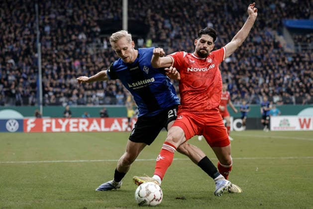 21.08.2026, xhettx, Fussball DFB Pokal 1.Runde, SV Waldhof Mannheim - 1.FC Kaiserslautern v.l. Zweikampf zwischen Julian Rieckmann (SV Waldhof Mannheim, 21) und Semih Sahin (1. FC Kaiserslautern, 8) (DFL DFB REGULATIONS PROHIBIT ANY USE OF PHOTOGRAPHS as IMAGE SEQUENCES and or QUASI-VIDEO) *** August 21, 2026, xhettx, Soccer DFB Cup 1st Round, SV Waldhof Mannheim vs. 1. FC Kaiserslautern: A tackle between Julian Rieckmann of SV Waldhof Mannheim, 21 and Semih Sahin of 1. FC Kaiserslautern, 8. DFL and DFB regulations prohibit any use of photographs as image sequences and or quasi-video.