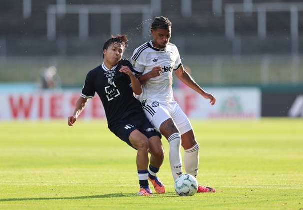 21.08.2026, Fussball DFB-Pokal, 1. Runde, SC St. Tönis - Eintracht Frankfurt, v.l., Hiroya Suguro (SC St. Tönis), Otavio Galdino Fernandes (Eintracht Frankfurt) DFL DFB REGULATIONS PROHIBIT ANY USE OF PHOTOGRAPHS AS IMAGE SEQUENCES AND OR QUASI-VIDEO. xdcx *** August 21, 2026, DFB Cup Soccer, 1st Round, SC St. Tönis vs. Eintracht Frankfurt, from left: Hiroya Suguro (SC St. Tönis), Otavio Galdino Fernandes (Eintracht Frankfurt). DFL and DFB regulations prohibit any use of photographs as image sequences and or quasi-video. xdcx Copyright: HMBxMedia Claus