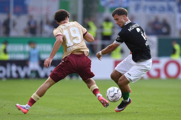 Fußball DFB-Pokal 1. Runde SC Preußen Münster - Karlsruher SC am 21.08.2026 im LVM-Preußenstadion in Münster Louey Ben Farhat ( Karlsruhe ), links - Louis Kolbe ( Münster ), rechts DFB regulations prohibit any use of photographs as image sequences and or quasi-video. *** Soccer: DFB Cup, First Round—SC Preußen Münster vs. Karlsruher SC on August 21, 2026, at the LVM Preußenstadion in Münster. Louey Ben Farhat (Karlsruhe, left); Louis Kolbe (Münster, right). DFB regulations prohibit any use of photographs as image sequences and or quasi-video. xRx