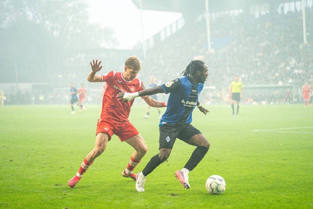 21.08.2026, xdaymx, Fussball DFB Pokal 1.Runde, SV Waldhof Mannheim - 1.FC Kaiserslautern. vl. Paul Joly (FCK) im Zweikampf mit Darnell Keumo (SVW). (DFL DFB REGULATIONS PROHIBIT ANY USE OF PHOTOGRAPHS as IMAGE SEQUENCES and or QUASI-VIDEO) Mannheim *** August 21, 2026, xdaymx, Soccer DFB Cup First Round, SV Waldhof Mannheim 1 FC Kaiserslautern, coach Paul Joly (FCK) in a tackle with Darnell Keumo (SVW), DFL, DFB. REGULATIONS PROHIBIT ANY USE OF PHOTOGRAPHS AS IMAGE SEQUENCES AND OR QUASI-VIDEO, Mannheim