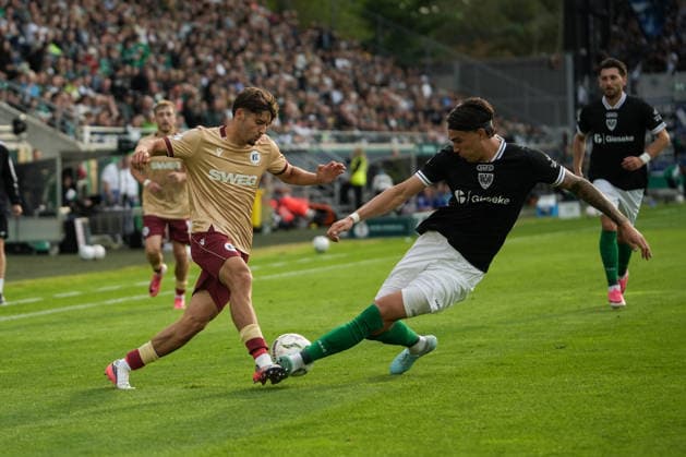 Deutschland: DFB Pokal 2026 2027 1.Runde, SC Preußen Münster vs Karlsruher SC, Freitag 21.08.2026 LVM-Preußenstadion (Münster, Nordrhein-Westfalen, Deutschland) Zweikampf Grätsche Antonio Tikvic (SC Preußen Münster, 4) gegen Rafael Pinto Pedrosa (Karlsruher SC, 36) *** Germany DFB Cup 2026–2027, First Round: SC Preußen Münster vs. Karlsruher SC, Friday, August 21, 2026, LVM Preußenstadion, Münster, North Rhine-Westphalia, Germany; Tackle by Antonio Tikvic (SC Preußen Münster, No. 4) on Rafael Pinto Pedrosa (Karlsruher SC, No. 36) Copyright: xMerlexKölkingx