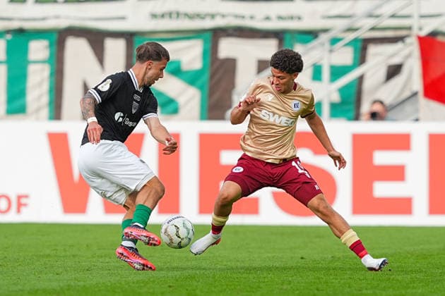 21.08.2026, xydrx, Fußball, DFB Pokal, SC Preußen Münster - Karlsruher SC, Saison 2026 2027, LVM-Preußenstadion: Louis Kolbe (SC Preußen Muenster, 2) im Zweikampf gegen Louey Ben Farhat (Karlsruher SC, 19) DFB regulations prohibit any use of photographs as image sequences and or quasi-video. *** August 21, 2026, xydrx, Soccer, DFB Cup, SC Preußen Münster vs. Karlsruher SC, 2026–2027 season, LVM Preußenstadion Louis Kolbe SC Preußen Münster, 2 in a tackle against Louey Ben Farhat Karlsruher SC, 19 DFB regulations prohibit any use of photographs as image sequences and or quasi-video Copyright: HMBxMedia YannisxDreimann