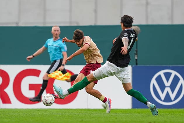 21.08.2026, xydrx, Fußball, DFB Pokal, SC Preußen Münster - Karlsruher SC, Saison 2026 2027, LVM-Preußenstadion: Rafael Pinto Pedrosa (Karlsruher SC, 36) im Zweikampf gegen Antonio Tikvic (SC Preußen Muenster, 4) DFB regulations prohibit any use of photographs as image sequences and or quasi-video. *** August 21, 2026, xydrx, Soccer, DFB Cup, SC Preußen Münster vs. Karlsruher SC, 2026–2027 season, LVM Preußenstadion, Rafael Pinto Pedrosa, Karlsruher SC, No. 36 in a tackle against Antonio Tikvic of SC Preußen Münster; DFB regulations prohibit any use of photographs as image sequences and or quasi-video Copyright: HMBxMedia YannisxDreimann