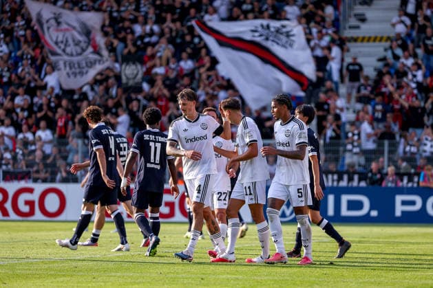 21.08.2026, Fußball, SC St. Tönis - Eintracht Frankfurt, 1. Runde DFB-Pokal 2026 27, Grotenburg-Stadion in Krefeld, Saison 2026 2027: Torjubel nach dem Tor zum 9:0 durch Torschütze Younes Ebnoutalib (Eintracht Frankfurt 11) zusammen mit Robin Koch (Eintracht Frankfurt 04) Otavio Galdino Fernandes(Eintracht Frankfurt 05) DFB regulations prohibit any use of photographs as image sequences and or quasi-video. Nordrhein-Westfalen Deutschland *** August 21, 2026, Soccer, SC St. Tönis vs. Eintracht Frankfurt, First Round of the 2026–27 DFB Cup, Grotenburg Stadium in Krefeld, 2026–2027 season: Goal celebration after the 9–0 goal by scorer Younes Ebnoutalib (Eintracht Frankfurt 11) together with Robin Koch (Eintracht Frankfurt 04) and Otavio Galdino Fernandes (Eintracht Frankfurt 05). DFB regulations prohibit any use of photographs as image sequences and or quasi-video in North Rhine-Westphalia, Germany