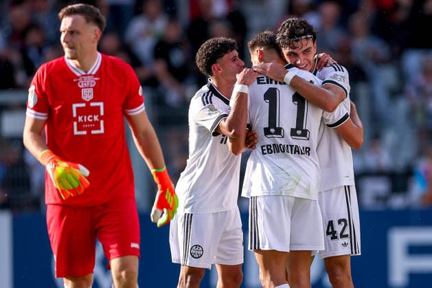 21.08.2026, Fußball, SC St. Tönis - Eintracht Frankfurt, 1. Runde DFB-Pokal 2026 27, Grotenburg-Stadion in Krefeld, Saison 2026 2027: Torjubel nach dem Tor zum 6:0 durch Torschütze Can Uzun (Eintracht Frankfurt 42) zusammen mit Younes Ebnoutalib (Eintracht Frankfurt 11) Ayoube Amaimouni-Echghouyab (Eintracht Frankfurt 29) DFB regulations prohibit any use of photographs as image sequences and or quasi-video. Nordrhein-Westfalen Deutschland *** August 21, 2026, Soccer, SC St. Tönis vs. Eintracht Frankfurt, 1st Round of the 2026–27 DFB Cup, Grotenburg Stadium in Krefeld, 2026–2027 season: Goal celebration after the 6–0 goal scored by Can Uzun (No. 42), Eintracht Frankfurt, together with Younes Ebnoutalib (No. 11), Eintracht Frankfurt, and Ayoube Amaimouni Echghouyab (No. 29), Eintracht Frankfurt. DFB regulations prohibit any use of photographs as image sequences and or quasi-video—North Rhine-Westphalia, Germany
