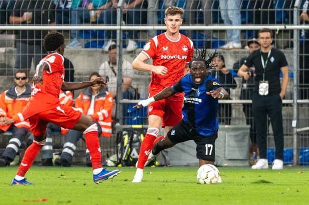 DFB-Pokal: SV Waldhof Mannheim vs 1. FC Kaiserslautern, 21.08.2026 Zweikampf zwischen Owono-Darnell Keumo (SV Waldhof Mannheim, 17), Fabian Kunze (1. FC Kaiserslautern, 6) DFB-Pokal: SV Waldhof Mannheim vs 1. FC Kaiserslautern, Carl-Benz-Stadion, 21.08.2026 DFB DFL REGULATIONS PROHIBIT ANY USE OF PHOTOGRAPHS AS IMAGE SEQUENCES AND OR QUASI-VIDEO. *** DFB Cup: SV Waldhof Mannheim vs. 1 FC Kaiserslautern, August 21, 2026. Tackle between Owono and Darnell Keumo (SV Waldhof Mannheim), 17, Fabian Kunze of 1 FC Kaiserslautern, 6 DFB Cup: SV Waldhof Mannheim vs. 1 FC Kaiserslautern, Carl Benz Stadium, August 21, 2026 DFB and DFL regulations prohibit any use of photographs as image sequences and or quasi-video. Copyright: xBEAUTIFULxSPORTS Hillx