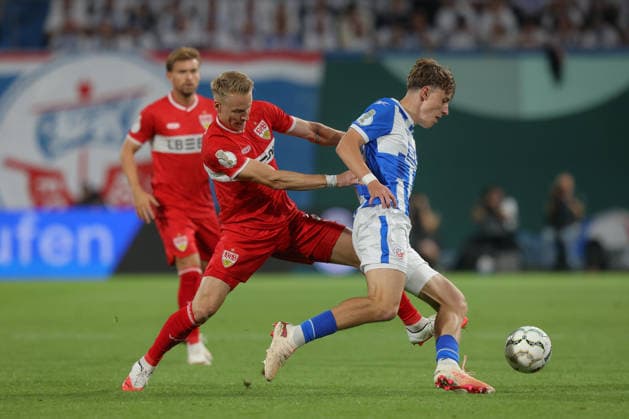 21.08.2026, xtgx, Fussball DFB-Pokal 1. Runde, FC Hansa Rostock - VfB Stuttgart, v.l. Chris Führich (Stuttgart, 10) Yannick Michaelis (Rostock, 41) Zweikampf, Duell, Kampf, tackle (DFL DFB REGULATIONS PROHIBIT ANY USE OF PHOTOGRAPHS as IMAGE SEQUENCES and or QUASI-VIDEO) Rostock *** August 21, 2026, xtgx, Soccer DFB Cup 1st Round, FC Hansa Rostock vs. VfB Stuttgart, from left: Chris Führich (Stuttgart), 10 Yannick Michaelis (Rostock), 41 Tackle, duel, battle, DFL and DFB regulations prohibit any use of photographs as image sequences and or quasi-video, Rostock