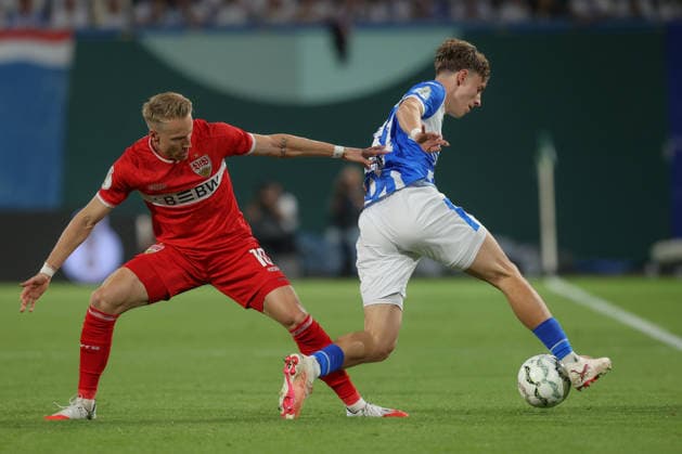 21.08.2026, xtgx, Fussball DFB-Pokal 1. Runde, FC Hansa Rostock - VfB Stuttgart, v.l. Chris Führich (Stuttgart, 10) Yannick Michaelis (Rostock, 41) Zweikampf, Duell, Kampf, tackle (DFL DFB REGULATIONS PROHIBIT ANY USE OF PHOTOGRAPHS as IMAGE SEQUENCES and or QUASI-VIDEO) Rostock *** August 21, 2026, xtgx, Soccer DFB Cup 1st Round, FC Hansa Rostock vs. VfB Stuttgart, from left: Chris Führich (Stuttgart), 10 Yannick Michaelis (Rostock), 41 Tackle, duel, battle, DFL and DFB regulations prohibit any use of photographs as image sequences and or quasi-video, Rostock