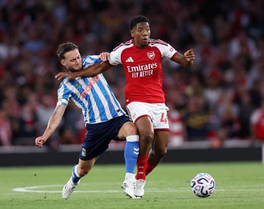 London, England, 21st August 2026. Matt Grimes of Coventry City tackles Myles Lewis-Skelly of Arsenal during the Arsenal vs Coventry City Premier League match at the Emirates Stadium, London. Picture credit should read: David Klein Sportimage EDITORIAL USE ONLY. No use with unauthorised audio, video, data, fixture lists, club league logos or live services. Online in-match use limited to 120 images, no video emulation. No use in betting, games or single club league player publications. SPI_064_DK_Arsenal_Coventry SPI-4924-0064