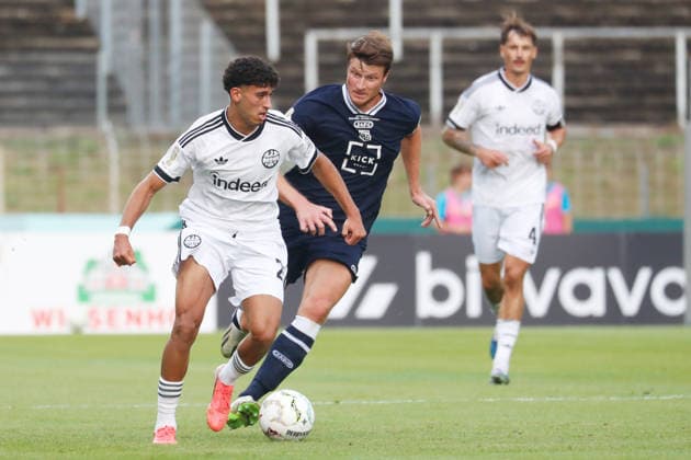 Krefeld, Deutschland 21. August 2026: DFB-Pokal - 2026 2027 - 1. Runde - SC St. Tönis 1911 20 gegen Eintracht Frankfurt Im Bild: v. li. im Zweikampf Ayoube Amaimouni-Echghouyab (Frankfurt) und Morten Heffungs (Tönis) DFB DFL regulations prohibit any use of photographs as image sequences and or quasi-video Grotenburg Nordrhein Westfalen *** Krefeld, Germany, August 21, 2026, 2026–2027 DFB Cup, First Round: SC St. Tönis 1911 20 vs. Eintracht Frankfurt. Pictured, from left, in a tackle: Ayoube Amaimouni Echghouyab (Frankfurt) and Morten Heffungs (Tönis)is. DFB and DFL regulations prohibit any use of photographs as image sequences and or quasi-video. Grotenburg, North Rhine-Westphalia Copyright: xFotostandx xvanxderxVeldenx