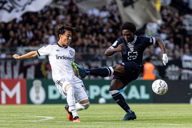 DFB-Pokal, 2026 2027, 1. Runde: SC St. Tönis 11 20 - Eintracht Frankfurt; 21.08.2026 Keita Kosugi (Eintracht Frankfurt, 26), Tyler Nkamanyi (SC St. Tönis 11 20, 11) DFB-Pokal, 2026 2027, 1. Runde: SC St. Tönis 11 20 - Eintracht Frankfurt; Grotenburg-Stadion, Krefeld; 21.08.2026 *** DFB Cup, 2026–2027, 1st Round: SC St. Tönis 11–20 Eintracht Frankfurt, August 21, 2026; Keita Kosugi (Eintracht Frankfurt, 26), Tyler Nkamanyi (SC St. Tönis 11–20), 11 DFB Cup, 2026–2027, 1st Round: SC St. Tönis 11:20 Eintracht Frankfurt, Grotenburg Stadium, Krefeld, August 21, 2026 Copyright: xBEAUTIFULxSPORTS Buriakovx