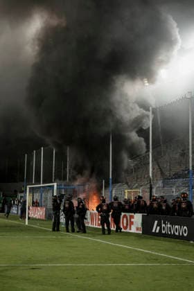 21.08.2026, xhettx, Fussball DFB Pokal 1.Runde, SV Waldhof Mannheim - 1.FC Kaiserslautern v.l. Lauternfans legen ein Feuer im Gästeblock (DFL DFB REGULATIONS PROHIBIT ANY USE OF PHOTOGRAPHS as IMAGE SEQUENCES and or QUASI-VIDEO) *** August 21, 2026, xhettx, Soccer DFB Cup 1st Round, SV Waldhof Mannheim 1 FC Kaiserslautern – Lautern fans set a fire in the visitors section. DFL and DFB regulations prohibit any use of photographs as image sequences and or quasi-video.