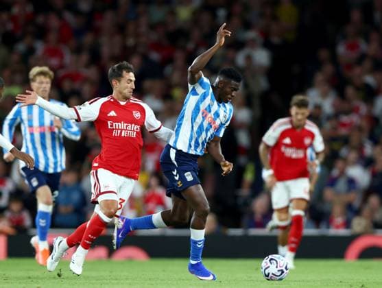 Taiwo Awoniyi of Coventry City in action against Martin Zubimendi of Arsenal during the Premier League match between Arsenal and Coventry City at Emirates Stadium on August 21, 2026 in London, England. Arsenal v Coventry City, Premier League Football, Football, Emirates Stadium, London, UK - 21 Aug 2026London Emirates Stadium United Kingdom EDITORIAL USE ONLY No use with unauthorised audio, video, data, fixture lists, club league logos or live services. Online in-match use limited to 120 images, no video emulation. No use in betting, games or single club league player publications.  Copyright: xKieranxMcManus Shutterstockx 17111303ey