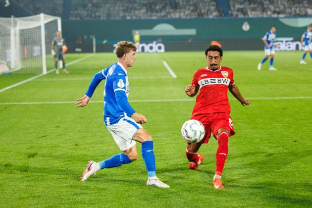links Florian Bohnert (Rostock) gegen Tiago Tomas (VfB) ; GER, FC Hansa Rostock vs. VfB Stuttgart, Fußball, Männer, DFB-Pokal, 01. Runde, Spielzeit 2026 2027, 21.08.2026 Rostock Ostseestadion Mecklenburg - Vorpommern Deutschland *** Left: Florian Bohnert (Rostock) vs. Tiago Tomas (VfB GER), FC Hansa Rostock vs. VfB Stuttgart, Soccer, Men, DFB Cup, First Round, 2026–2027 Season, August 21, 2026, Rostock Ostseestadion, Mecklenburg-Western Pomerania, Germany