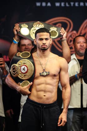 August 21, 2026: Rolando Romero holds a championship belt while on stage during weigh-ins before the Romero vs Lopez event inside the Presidio Ballroom at Park MGM on August 21, 2026 in Las Vegas, NV. CSM. Boxing 2026: Romero Vs Lopez Weigh-In AUG 21  - ZUMAc04_ 20260821_zma_c04_029 Copyright: xChristopherxTrimx