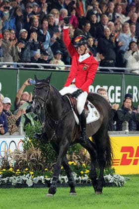1. Platz Mannschafts-Weltmeister Deutschland Germany, Daniel Deusser (GER, Deutschland) mit Pferd Otello de Guldenboom, Emotion, Jubel, FEI Jumping World Championship, WM, Weltmeisterschaft Second Competition Team Final & Second Individual Qualifier Mercedes-Benz Prize Round 2 - Competition only, Springen, Mannschafts-Weltmeister Springen, WM Logo, 1. platz, Gewinnerin, Weltmeister,FEI Jumping World Championship , Turkish Airlines-Prize, Einzel und Teamwertung, Jumping , AACHEN - FEI World Championships 2026, Weltfest des Pferdesports, Reitsport Weltmeisterschaft 2026, Aachen 2026, Welcome Home 2026, Aachener Soers, 11. bis 23. August 2026, Reitsport, 21.08.2026, Aachen Aachener Soers Deutschland *** 1st Place Team World Champion Germany, Daniel Deusser GER, Germany riding Otello de Guldenboom, Emotion, Jubilation, FEI Jumping World Championship Second Competition Team Final Second Individual Qualifier Mercedes-Benz Prize Round 2 Competition only, Show Jumping, Team World Champions in Show Jumping, World Championships Logo, 1st Place, Winner, World Champion, FEI Jumping World Championship, Turkish Airlines Prize, Individual and Team Standings, Show Jumping, AACHEN FEI World Championships 2026, World Equestrian Festival, 2026 World Equestrian Championships, Aachen 2026, Welcome Home 2026, Aachener Soers, August 11–23, 2026, Equestrian Sports, August 21, 2026, Aachen, Aachener Soers, Germany