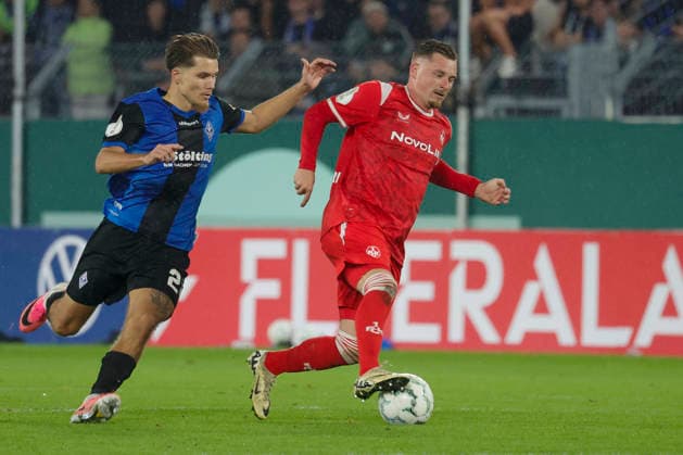 Im Bild: v.li. Diego Michel (SV Waldhof Mannheim 07, 28) am Ball gegen Marlon Ritter (1. FC Kaiserslautern, 7) 21.08.2026, SV Waldhof Mannheim 07 - 1. FC Kaiserslautern, DFB-Pokal, 1. Runde, Deutschland, Mannheim, Carl-Benz-Stadion, DFL REGULATIONS PROHIBIT ANY USE OF PHOTOGRAPHS AS IMAGE SEQUENCES AND OR QUASI-VIDEO. *** Pictured from left: Diego Michel (SV Waldhof Mannheim 07), 28, with the ball against Marlon Ritter (1 FC Kaiserslautern), 7, on August 21, 2026, SV Waldhof Mannheim 07 vs. 1 FC Kaiserslautern, DFB Cup, First Round, Germany, Mannheim, Carl Benz Stadium, DFL regulations prohibit any use of photographs as image sequences and or quasi-video Copyright: HMBxMedia xJulienxBecker