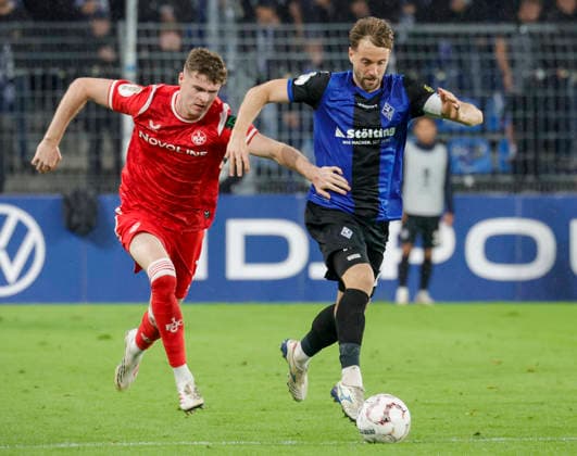 Im Bild: v.li. Alex Murphy (1. FC Kaiserslautern, 3) im Zweikampf gegen Lukas Kluenter (SV Waldhof Mannheim 07, 24) 21.08.2026, SV Waldhof Mannheim 07 - 1. FC Kaiserslautern, DFB-Pokal, 1. Runde, Deutschland, Mannheim, Carl-Benz-Stadion, DFL REGULATIONS PROHIBIT ANY USE OF PHOTOGRAPHS AS IMAGE SEQUENCES AND OR QUASI-VIDEO. *** Pictured from left: Alex Murphy (1 FC Kaiserslautern), 3, in a tackle against Lukas Kluenter (SV Waldhof Mannheim 07), 24, on August 21, 2026, SV Waldhof Mannheim 07 vs. 1 FC Kaiserslautern, DFB Cup, First Round, Germany, Mannheim, Carl Benz Stadium, DFL regulations prohibit any use of photographs as image sequences and or quasi-video Copyright: HMBxMedia xJulienxBecker