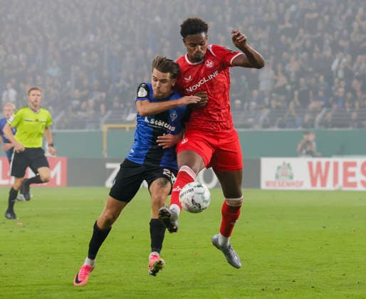 Im Bild: v.li. Diego Michel (SV Waldhof Mannheim 07, 28) im Zweikampf gegen Kelven Frees (1. FC Kaiserslautern, 5) 21.08.2026, SV Waldhof Mannheim 07 - 1. FC Kaiserslautern, DFB-Pokal, 1. Runde, Deutschland, Mannheim, Carl-Benz-Stadion, DFL REGULATIONS PROHIBIT ANY USE OF PHOTOGRAPHS AS IMAGE SEQUENCES AND OR QUASI-VIDEO. *** Pictured, from left: Diego Michel (SV Waldhof Mannheim 07), 28, in a tackle against Kelven Frees (1. FC Kaiserslautern), 5, on August 21, 2026, SV Waldhof Mannheim 07 vs. 1 FC Kaiserslautern, DFB Cup, First Round, Germany, Mannheim, Carl Benz Stadium, DFL regulations prohibit any use of photographs as image sequences and or quasi-video Copyright: HMBxMedia xJulienxBecker