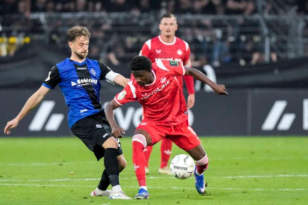 v.li.: Lukas Klünter (SV Waldhof, 24), Ibrahim Kanate (FCK, 11), Zweikampf, Spielszene, Duell, duel, tackle, tackling, Dynamik, Action, Aktion, 21.08.2026, Mannheim (Deutschland), Fussball, DFB-Pokal, 1. Runde, SV Waldhof Mannheim - 1. FC Kaiserslautern, DFB DFL REGULATIONS PROHIBIT ANY USE OF PHOTOGRAPHS AS IMAGE SEQUENCES AND OR QUASI-VIDEO. *** From left: Lukas Klünter (SV Waldhof), 24; Ibrahim Kanate (FCK), 11; tackle, game scene, duel, tackle, tackling, dynamic, action, 21 Aug 2026, Mannheim, Germany, soccer, DFB Cup, 1st round, SV Waldhof Mannheim 1 vs. FC Kaiserslautern, DFB DFL REGULATIONS PROHIBIT ANY USE OF PHOTOGRAPHS AS IMAGE SEQUENCES AND OR QUASI-VIDEO xozx
