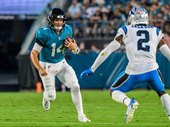 Aug 21, 2026; Jacksonville, Florida, USA; Jacksonville Jaguars quarterback Nick Mullens (14) scrambles for a first down during the first half of preseason game against the Carolina Panthers at Everbank Stadium. Mandatory Credit: -Cal Media Jacksonville USA - ZUMAcg2_ 20221124_faf_cg2_021 Copyright: xRomeoxGuzmanx