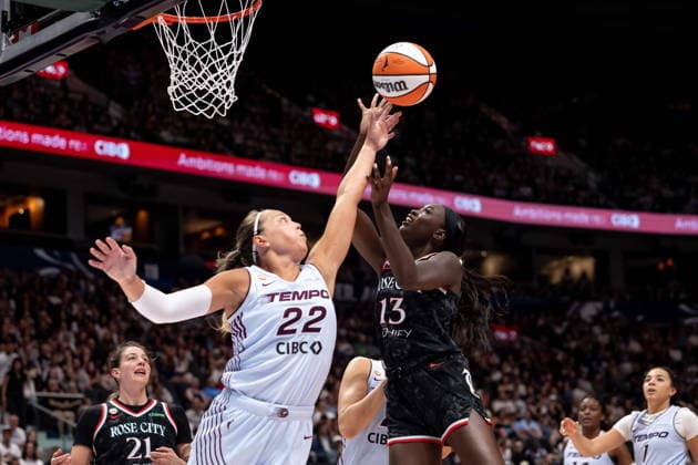 August 21, 2026, Vancouver, Bc, CANADA: Toronto Tempo s Julie Allemand (22) blocks Portland Fire s Nyadiew Puoch (13) during the second half of a WNBA, Basketball Damen, USA basketball game in Vancouver, on Friday, August 21, 2026. Canada News - August 21, 2026  - ZUMAc35_ 20260821_zaf_c35_222 Copyright: xEthanxCairnsx