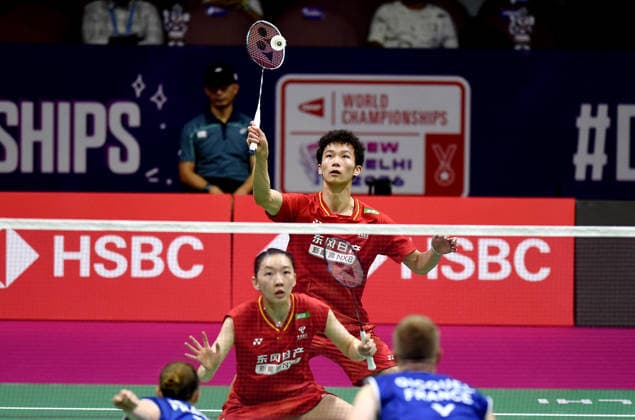 (260822) -- NEW DELHI, Aug. 22, 2026 -- Jiang Zhenbang (top) Wei Yaxin of China compete during the mixed doubles semifinal match between Jiang Zhenbang Wei Yaxin of China and Thom Gicquel Delphine Delrue of France at BWF World Championships in New Delhi, India, Aug. 22, 2026. (Photo by Xinhua) (SP)INDIA-NEW DELHI-BADMINTON-BWF WORLD CHAMPIONSHIPS-MIXED DOUBLES JavedxDar 