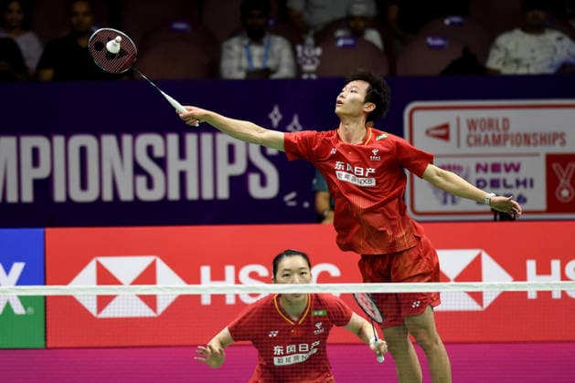 (260822) -- NEW DELHI, Aug. 22, 2026 -- Jiang Zhenbang (top) Wei Yaxin of China compete during the mixed doubles semifinal match between Jiang Zhenbang Wei Yaxin of China and Thom Gicquel Delphine Delrue of France at BWF World Championships in New Delhi, India, Aug. 22, 2026. (Photo by Xinhua) (SP)INDIA-NEW DELHI-BADMINTON-BWF WORLD CHAMPIONSHIPS-MIXED DOUBLES JavedxDar 