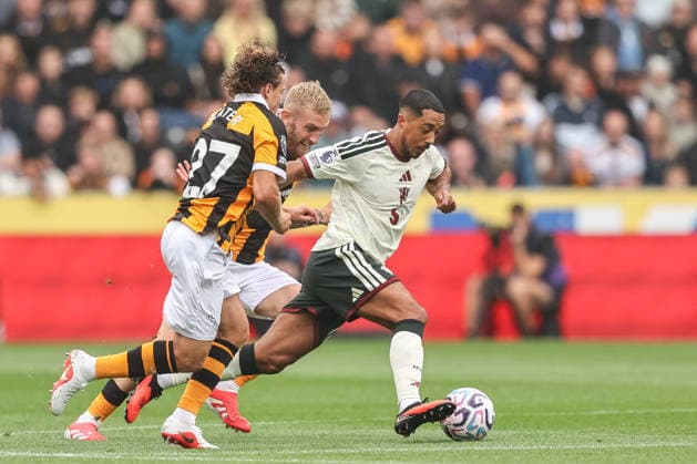 Premier League: Hull City v Manchester United, ManU Youri Tielemans of Manchester United breaks with the ball under pressure from Oliver McBurnie of Hull City and Regan Slater of Hull City during the Premier League match Hull City vs Manchester United at MKM Stadium, Hull, United Kingdom on 22 August 2026 (Photo by Alfie Cosgrove News Images) Hull MKM Stadium East Riding of Yorkshire United Kingdom Copyright: xAlfiexCosgrove NewsxImagesx