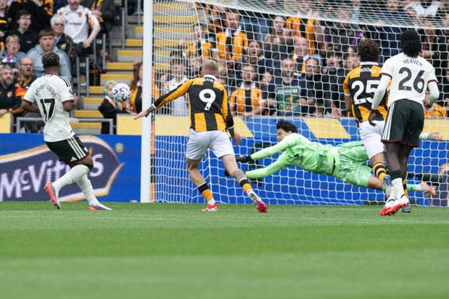 Hull City v Manchester United, ManU Premier League Manchester United goalkeeper Senne Lammens makes a save from Oliver McBurnie of Hull City during the Premier League match between Hull City and Manchester United at the MKM Stadium, Hull. 22 08 2026 UK Newspapers OUT Copyright: xMattxWilkinsonx FIL-23804-0090