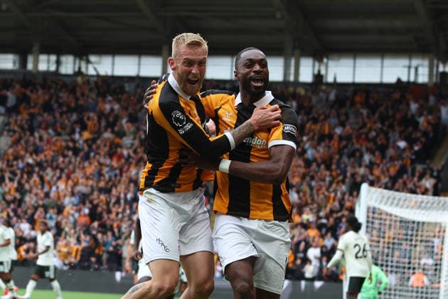 RECORD DATE NOT STATED 22nd August 2026; MKM Stadium, Hull, Yorkshire, England; Premier League Football, Hull City versus Manchester United, ManU Hull City s Semi Ajayi and Oli McBurnie celebrate the tigers opening the scoring DavidxLofthouse