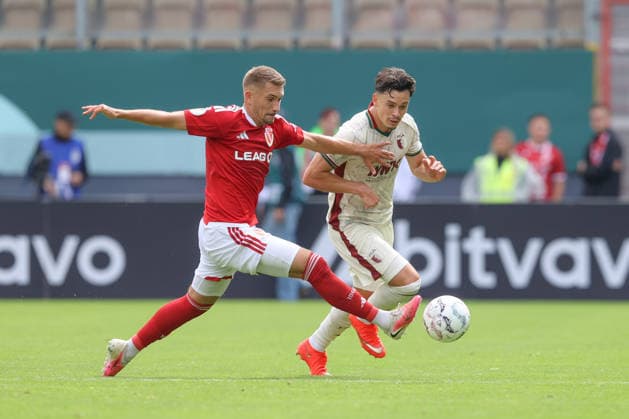 22.08.2026, xtgx, Fussball DFB-Pokal 1. Runde, FC Energie Cottbus - FC Augsburg, v.l. Julian Guttau (Cottbus, 17) Fabian Rieder (Augsburg, 32) Zweikampf, Duell, Kampf, tackle (DFL DFB REGULATIONS PROHIBIT ANY USE OF PHOTOGRAPHS as IMAGE SEQUENCES and or QUASI-VIDEO) Cottbus *** August 22, 2026, xtgx, Soccer DFB Cup 1st Round, FC Energie Cottbus vs. FC Augsburg, from left: Julian Guttau (Cottbus), 17 Fabian Rieder, Augsburg, 32 tackle, duel, battle, DFL and DFB regulations prohibit any use of photographs as image sequences and or quasi-video, Cottbus