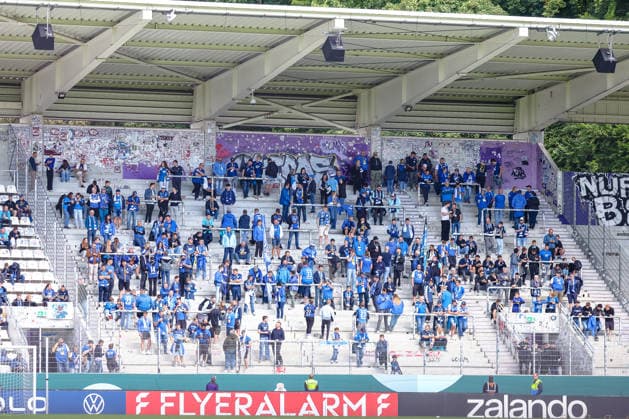 Mitgereiste Hoffenheimer Fans im Gaesteblock, FC Erzgebirge Aue vs. TSG Hoffenheim, Fussball, DFB Pokal, 1. Runde, Saison 2026 2027, 22.08.2026,¨ DFL REGULATIONS PROHIBIT ANY USE OF PHOTOGRAPHS AS IMAGE SEQUENCES AND OR QUASI-VIDEO,¨ FC Erzgebirge Aue vs. TSG Hoffenheim, Fussball, DFB Pokal, 1. Runde, Saison 2026 2027, 22.08.2026, Aue *** Hoffenheim fans who traveled with the team in the visitors section, FC Erzgebirge Aue vs. TSG Hoffenheim, soccer, DFB Cup, 1st round, 2026–2027 season, August 22, 2026, DFL regulations prohibit any use of photographs as image sequences and or quasi-video, FC Erzgebirge Aue vs. TSG Hoffenheim, soccer, DFB Cup, Round 1, 2026–2027 Season, August 22, 2026, Aue Copyright: xEibner-Pressefoto LauraxRoemerx EP_LRR
