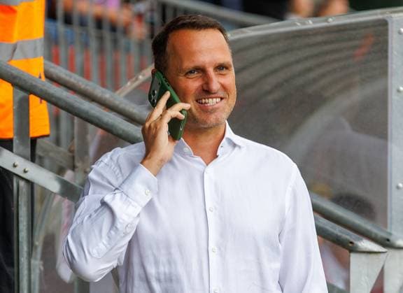 22.08.2026 - Fussball - Saison 2026 2027 - DFB Pokal Vereinspokal - 01. Runde: Viktoria Köln - 1. FC Nürnberg Nuernberg FCN ( Club ) - Sportfoto Zink DaMa - xdaxmax - regulations prohibit any use of photographs as image sequences and or quasi-video - Joti Chatzialexiou ( Vorstand 1. FC Nürnberg FCN ) telefoniert lacht Lachen freut sich Freude *** August 22, 2026 Soccer Season 2026–2027 DFB Cup Club Cup First Round Viktoria Cologne 1 FC Nuremberg Nuremberg FCN Club Sports Photo Zink DaMa xdaxmax regulations prohibit any use of photographs as image sequences and or quasi-video Joti Chatzialexiou, Sports Director of 1. FC Nürnberg (FCN), is on the phone, laughing, and looking happy