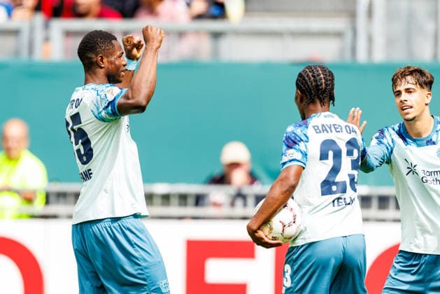 WIESBADEN, GERMANY - AUGUST 22: Christian Kofane (Bayer 04 Leverkusen, 35) celebrates scoring his team s fourth goal with teammates during the first-round match between SV Wehen Wiesbaden vs. Bayer 04 Leverkusen at Brita Arena of the German Cup on August 22, 2026 in Wiesbaden, Germany. DFL REGULATIONS PROHIBIT ANY USE OF PHOTOGRAPHS AS IMAGE SEQUENCES AND OR QUASI-VIDEO. Hessen Germany Copyright: xStephanxHahnex