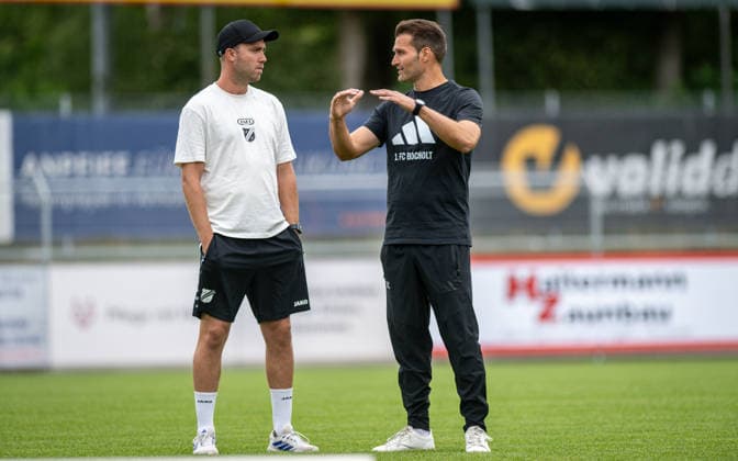 Fussball, Saison 2026 2027, Regionalliga West, 22.08.2026, 04. Spieltag, Herren, 1.FC Bocholt (schwarz) vs. SV Roedinghausen (weiss) v.l.: Fabian Luebbers (Trainer SV Roedinghausen), Guerino Capretti (Trainer, 1.FC Bocholt), Bocholt Stadion am Huenting Deutschland *** Soccer, 2026–2027 Season, Regionalliga West, August 22, 2026, Matchday 4, Men’s, 1 FC Bocholt (black) vs. SV Roedinghausen (white), L Fabian Luebbers, Coach of SV Roedinghausen; Guerino Capretti, Coach of 1 FC Bocholt; Bocholt Stadion am Huenting, Germany 260822_fb_1fc-bocholt_sv-roedinghausen_57779