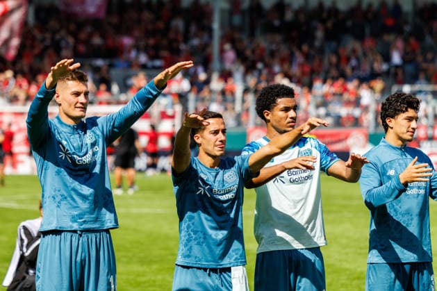 WIESBADEN, GERMANY - AUGUST 22: Lucas Vazquez (Bayer 04 Leverkusen, 17) and teammates celebrate after the team s victory in the first-round match between SV Wehen Wiesbaden vs. Bayer 04 Leverkusen at Brita Arena of the German Cup on August 22, 2026 in Wiesbaden, Germany. DFL REGULATIONS PROHIBIT ANY USE OF PHOTOGRAPHS AS IMAGE SEQUENCES AND OR QUASI-VIDEO. Hessen Germany Copyright: xStephanxHahnex