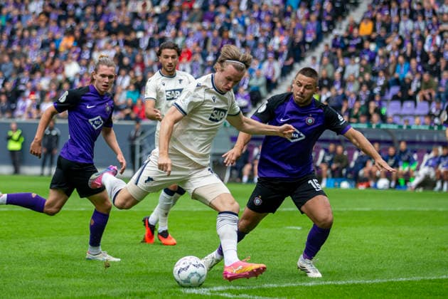 GER, Aue, Fussball, DFB-Pokal, 1. Hauptrunde, FC Erzgebirge Aue vs. TSG 1899 Hoffenheim im Bild v.l.: Patrick Wimmer (TSG Hoffenheim 08), Schuss zum 1:0 22.08.2026, EINS Erzgebirgsstadion Aue DFB REGULATIONS PROHIBIT ANY USE OF PHOTOGRAPHS AS IMAGE SEQUENCES AND OR QUASI-VIDEO, *** GER, Aue, Soccer, DFB Cup, 1st Round, FC Erzgebirge Aue vs. TSG 1899 Hoffenheim (pictured, from left): Patrick Wimmer (TSG Hoffenheim 08), shot for the 1-0 goal, August 22, 2026, EINS Erzgebirgsstadion, Aue. DFB regulations prohibit any use of photographs as image sequences and or quasi-video, Copyright: HMBxMedia PaulxFritz