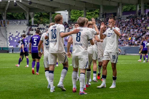 GER, Aue, Fussball, DFB-Pokal, 1. Hauptrunde, FC Erzgebirge Aue vs. TSG 1899 Hoffenheim im Bild v.l.: Hoffenheim Torjubel 22.08.2026, EINS Erzgebirgsstadion Aue DFB REGULATIONS PROHIBIT ANY USE OF PHOTOGRAPHS AS IMAGE SEQUENCES AND OR QUASI-VIDEO, *** GER, Aue, Soccer, DFB Cup, 1st Round, FC Erzgebirge Aue vs. TSG 1899 Hoffenheim in the photo (from left): Hoffenheim goal celebration, August 22, 2026, EINS Erzgebirgsstadion Aue. DFB regulations prohibit any use of photographs as image sequences and or quasi-video, Copyright: HMBxMedia PaulxFritz