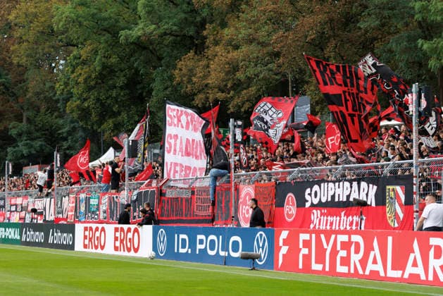 KOELN, GERMANY - AUGUST 22, 2026: The Nuernberg fans during the DFB-Cup match between Viktoria Koeln vs. 1. FC Nuernberg at the Sportpark Hoehenberg on August 22, 2026 in Koeln, Germany. DFL REGULATIONS PROHIBIT ANY USE OF PHOTOGRAPHS AS IMAGE SEQUENCES AND OR QUASI-VIDEO. Nordrhein-Westfalen Germany Copyright: xAxelxKohringx