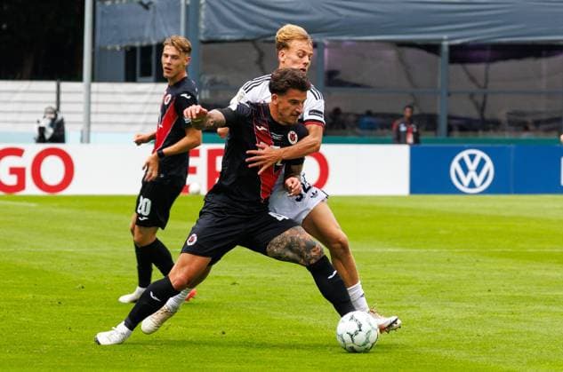 22.08.2026 - Fussball - Saison 2026 2027 - DFB Pokal Vereinspokal - 01. Runde: Viktoria Köln - 1. FC Nürnberg Nuernberg FCN ( Club ) - Sportfoto Zink DaMa - xdaxmax - regulations prohibit any use of photographs as image sequences and or quasi-video - Niklas Castelle (44, FC Viktoria Köln ) Tim Janisch (32, 1. FC Nürnberg FCN ) *** August 22, 2026 Soccer Season 2026–2027 DFB Cup Club Cup First Round Viktoria Cologne 1 FC Nuremberg Nuremberg FCN Club Sports Photo Zink DaMa xdaxmax Regulations prohibit any use of photographs as image sequences and or quasi-video Niklas Castelle 44, FC Viktoria Köln; Tim Janisch 32, 1. FC Nürnberg; FCN