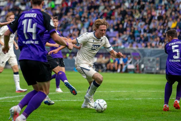 GER, Aue, Fussball, DFB-Pokal, 1. Hauptrunde, FC Erzgebirge Aue vs. TSG 1899 Hoffenheim im Bild v.l.: Wouter Burger (TSG Hoffenheim 18), Aktion mit Ball 22.08.2026, EINS Erzgebirgsstadion Aue DFB REGULATIONS PROHIBIT ANY USE OF PHOTOGRAPHS AS IMAGE SEQUENCES AND OR QUASI-VIDEO, *** GER, Aue, Soccer, DFB Cup, 1st Round, FC Erzgebirge Aue vs. TSG 1899 Hoffenheim in the photo (from left): Wouter Burger (TSG Hoffenheim 18), in action with the ball, August 22, 2026, EINS Erzgebirgsstadion, Aue. DFB regulations prohibit any use of photographs as image sequences and or quasi-video, Copyright: HMBxMedia PaulxFritz