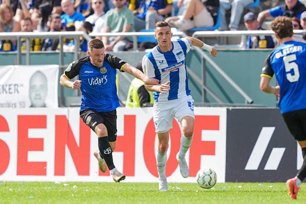 22.08.2026, xydrx, Fußball, DFB Pokal, 1. FC Saarbrücken - Hertha BSC, Saison 2026 2027, Ludwigsparkstadion: Christian Kuehlwetter (1.FC Saarbruecken, 10) im Zweikampf gegen Niklas Kolbe (Hertha BSC, 27) DFB regulations prohibit any use of photographs as image sequences and or quasi-video. *** August 22, 2026, xydrx, Soccer, DFB Cup, 1 FC Saarbrücken vs. Hertha BSC, 2026–2027 season, Ludwigsparkstadion, Christian Kuehlwetter, 1 FC Saarbrücken, No. 10 in a tackle against Niklas Kolbe of Hertha BSC, 27. DFB regulations prohibit any use of photographs as image sequences and or quasi-video. Copyright: HMBxMedia YannisxDreimann